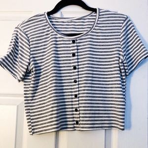 grey and white crop top.